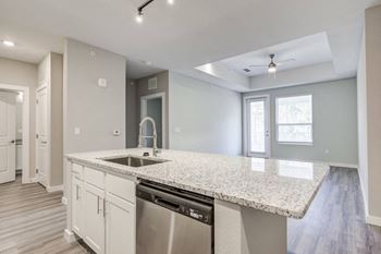 Table-sized kitchen island with culinary faucet